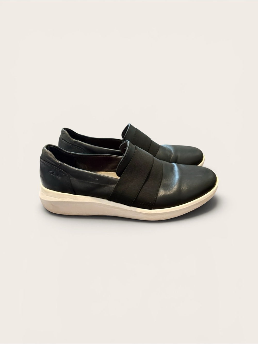 Clarks Black Slip-On Leather Flats with White Sole